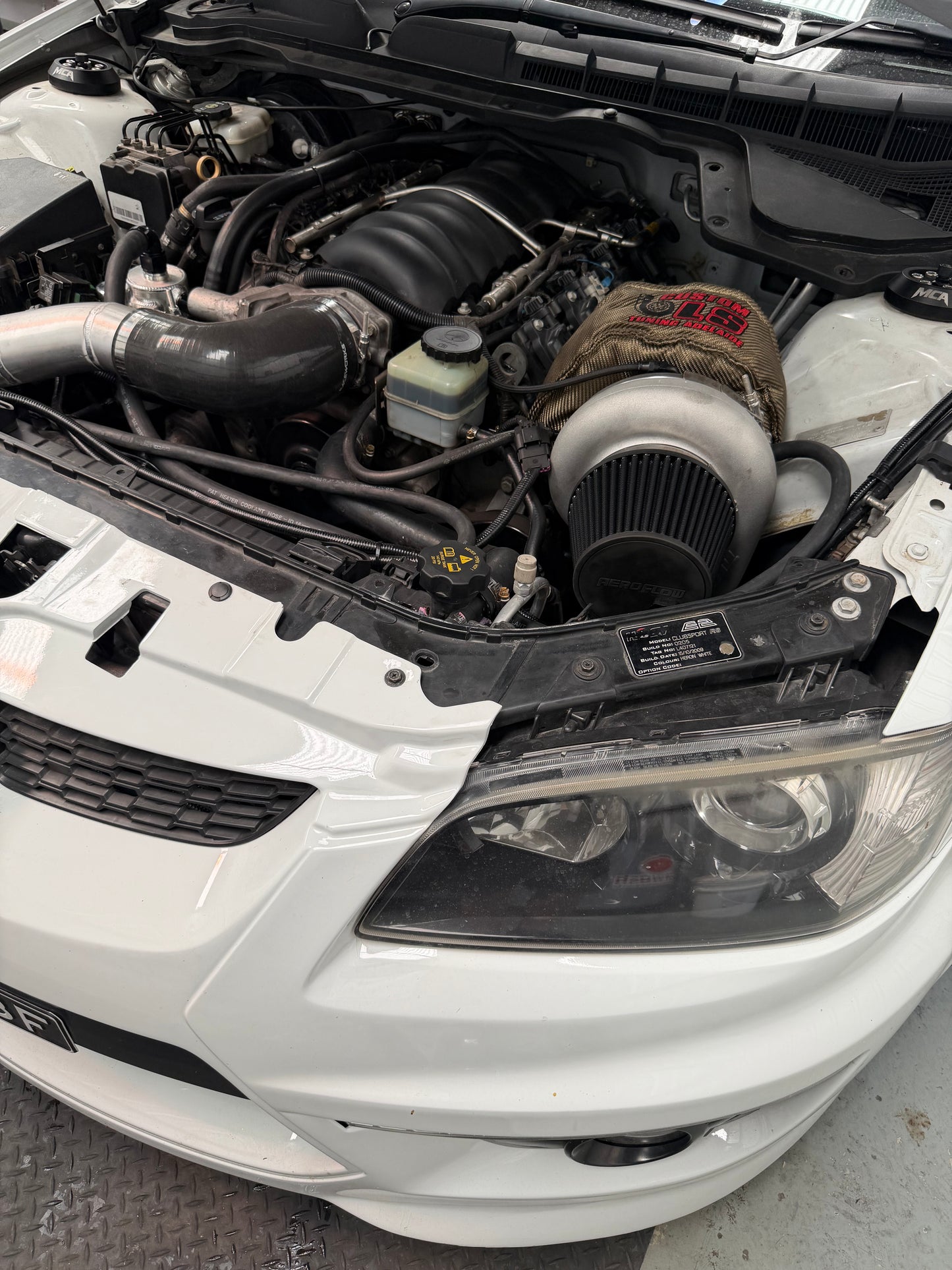 VE - VF Windscreen Washer bottle Relocation